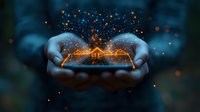 Magical glowing house emerging from cupped hands with floating light particles against dark background, creating dreamy atmospheric scene with bokeh effect.