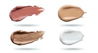 Cosmetic makeup foundation concealer cream smears isolated on white background for beauty and skincare product design.