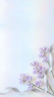 Delicate purple sweet pea flowers with white ribbon on soft pastel gradient background for spring wedding invitations and feminine design projects.
