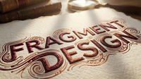 Fragment Design vintage typography logo with ornate decorative elements on textured paper background for branding and graphic design projects.