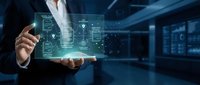 Businessman holding holographic digital interface with futuristic technology display in modern office environment for business innovation concepts.