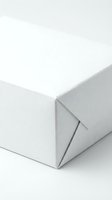 White cardboard box mockup on clean background for product packaging design and branding presentations.