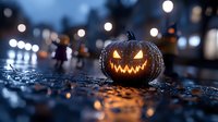 Glowing carved pumpkin with scary face on wet street at night, illuminated by bokeh lights. Halloween decoration creates spooky atmosphere on dark rainy evening.
