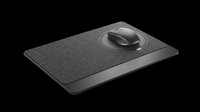 Black computer mouse pad with integrated wrist rest and wireless mouse, isolated on transparent background. Ready for clipart, print-on-demand, sublimation, and design projects.