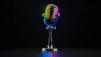 Retro style microphone with rainbow colored neon glow effect on black background, dramatic lighting for music and entertainment concepts.
