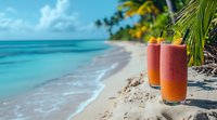 Tropical layered smoothies with fresh fruit garnish on sandy beach against turquoise ocean water and palm trees, summer vacation refreshment concept.