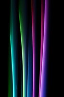 Vibrant glowing vertical light streaks in neon colors of turquoise, green, pink and purple against black background create modern abstract composition.