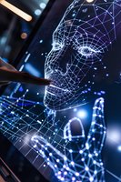 Digital wireframe face and hand visualization with glowing blue network connections on dark background illustrates artificial intelligence concept.