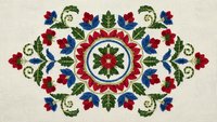 Traditional folk art embroidery pattern with red blue flowers and green leaves on cream background. Decorative floral motif for textile design.