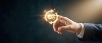 Businessman hand holding glowing clock symbol with light particles, representing time management, deadline, and business efficiency concept for corporate presentations.