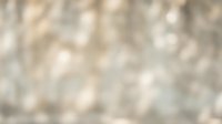 Abstract blurred bokeh background with soft golden and beige light circles creating dreamy atmosphere for design projects and overlays.