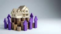 House model on stack of coins with purple upward arrows showing real estate investment growth and property value appreciation concept.