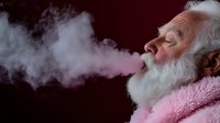 Senior Caucasian man with white beard exhaling smoke cloud against dark background, wearing pink fleece. Dramatic side profile lighting creates moody atmosphere.