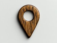 Wooden location pin marker with natural grain texture isolated on light background, suitable for maps and navigation design elements.