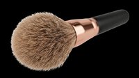 Fluffy makeup brush with natural bristles and rose gold ferrule isolated on transparent background, ready for beauty design, clipart, and print-on-demand products.