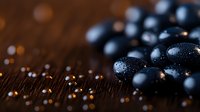 Fresh ripe blueberries with water drops on dark wooden background, macro shot with selective focus and bokeh lights for food photography.