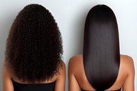 Comparison of natural curly afro hair texture and straight sleek hair on dark-skinned women showing different hairstyles and hair types from back view.