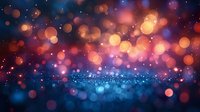 Magical bokeh lights creating dreamy atmosphere with orange and blue glowing particles, defocused background with sparkling effect for festive designs.