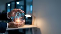 Hand holding glowing digital padlock with security network visualization, representing cybersecurity, data protection, and encryption technology for business solutions.