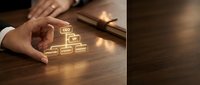 Young professional male hand arranging glowing organizational hierarchy chart on wooden desk, representing corporate structure, leadership planning, and business management strategy.