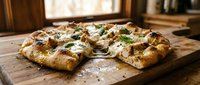 Focaccia bread with herbs and olive oil on wooden board, ready for serving or food photography projects.