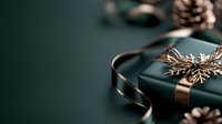 Dark green wrapped present with copper metallic ribbon and snowflake ornament against moody background. Elegant holiday gift box with pine cones creating festive winter atmosphere.