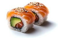 Fresh salmon rolls with cucumber, topped with raw fish, sesame seeds on white background, close-up view of Japanese cuisine sushi preparation.