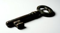Antique iron key with ornate oval handle isolated on white background, suitable for historical design, vintage decor, and heritage-themed projects.