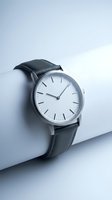 Modern minimalist wristwatch with black leather strap and white dial on clean white surface for luxury timepiece and fashion accessories marketing.