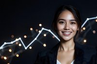 Young Asian businesswoman in black blazer smiling confidently against dark background with glowing growth chart and bokeh lights, representing success and achievement.