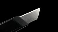 Utility knife blade with black handle isolated on transparent background, ready for clipart, t-shirt design, print-on-demand, stickers, and sublimation projects.