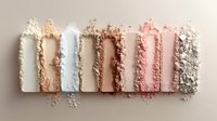 Crushed makeup powder swatches in neutral tones from white to beige and pink, arranged in rows on light background showing texture and pigmentation for cosmetic design.