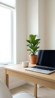 Minimalist home office workspace with laptop, fiddle leaf fig plant and coffee cup on wooden desk near bright window for remote work productivity.