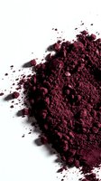 Crushed burgundy powder pigment scattered on white background, isolated and ready for cosmetics, makeup, design, and beauty product packaging applications.
