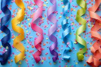 Colorful curled party streamers and scattered confetti on bright blue background create festive carnival atmosphere for celebration and holiday designs.