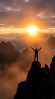 Silhouette of triumphant hiker with raised arms standing on mountain peak at golden sunrise overlooking dramatic landscape with layered peaks and valleys.