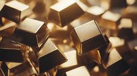 Shiny gold bars scattered in dramatic lighting with reflective surfaces and soft bokeh effect creating luxury financial concept for wealth and investment background.