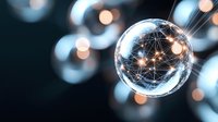 Glowing network connections inside transparent sphere with bokeh light effects in background, representing global digital connectivity and communication.