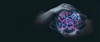 Hand holding glowing neon brain with neural connections and digital particles, representing artificial intelligence, innovation, and futuristic technology concepts.