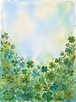 Watercolor green clover and shamrock botanical border with soft blue sky background, copy space for St. Patricks Day greeting cards.