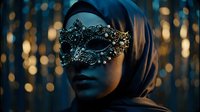Mysterious woman wearing ornate black lace masquerade mask with golden bokeh lights creating dramatic atmosphere for elegant party or carnival celebration.