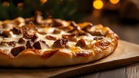 Fresh baked pizza with melted mozzarella cheese and crispy bacon pieces on wooden cutting board, warm bokeh lights in background, macro food photography.