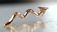 Golden arrow shaped graph moving upward on reflective surface with water drops, representing financial growth and business success in modern minimal style.
