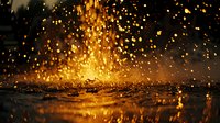 Dramatic golden rain drops splashing on dark reflective surface with bokeh light effects creating magical atmosphere for atmospheric backgrounds.