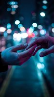 Two hands touching gently against blurred neon city lights at night, conveying connection, support, and intimate moments for relationship and emotional content.