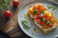 Gourmet toast with cream cheese, fresh cherry tomatoes and basil on white plate. Healthy breakfast or appetizer on wooden board.