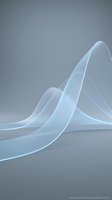 Abstract flowing ribbons of translucent light blue fabric wave across neutral gray background, creating elegant curves and dynamic movement for modern design projects.