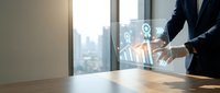 Professional businessman using holographic digital interface technology with data analytics icons in modern office environment for business innovation.