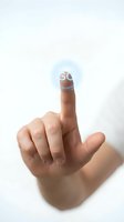 Human finger touching glowing digital button interface on white background for technology and user interaction concepts.