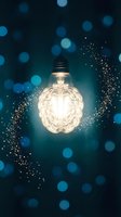 Glowing brain-shaped light bulb with golden particles and blue bokeh background representing creativity, innovation, intelligence and bright ideas concept.